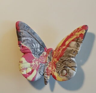 Figurine porcelaine papillon rouge, marron, jaune